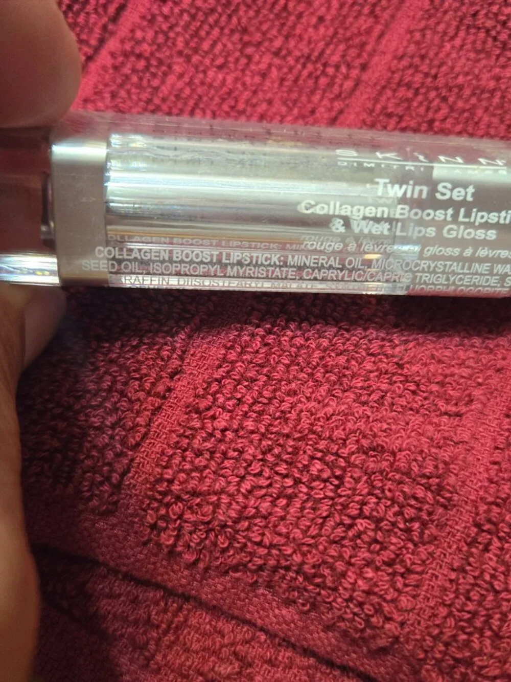 Skinn Cosmetics Twin Set features a Collagen Boost Lipstick and a Wet Lips Gloss